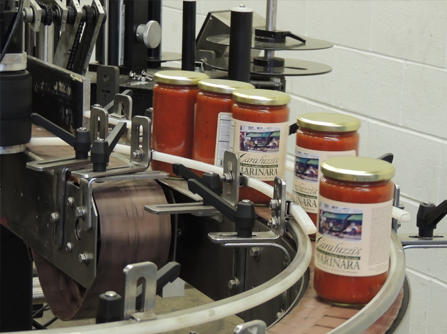 Caraluzzi's Marinara Sauce being made - jars on assembly line
